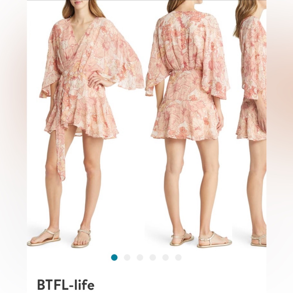 Embroidered dolman sleeve wrap dress.